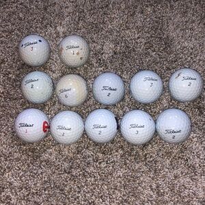 12 Used Titleist golf balls